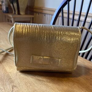 Small metallic gold crossbody bag